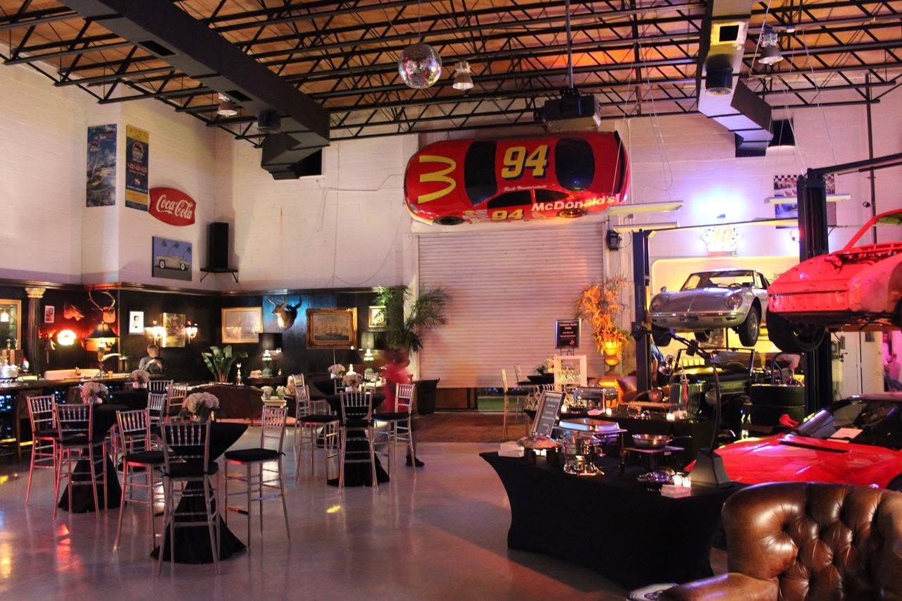 Bill Elliott's McDonald's number 94 NASCAR stock car, a 1988 Ford Thunderbird, mounted above the 51 Club shop floor