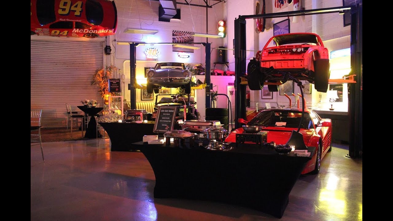 Classic cars and lounge seating inside 51 Club Orlando in Winter Park
